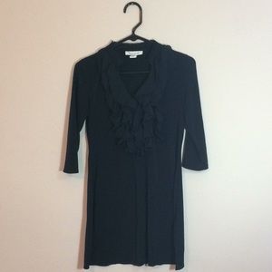 Ruffle plunge neck tunic will be donated 5/2024